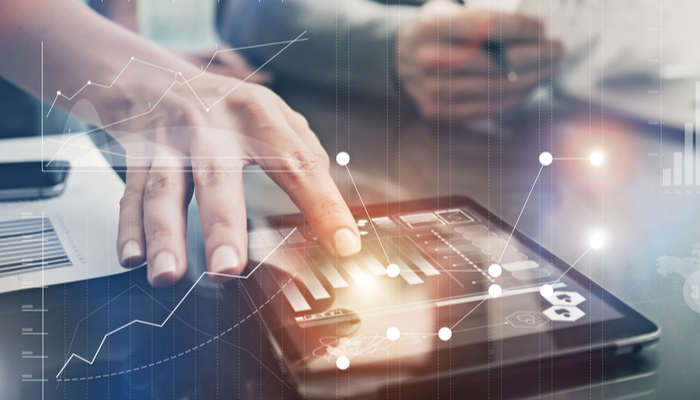 hand typing on an ipad