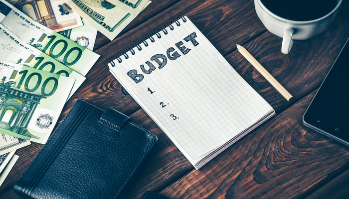 a notepad with the word budget written on it