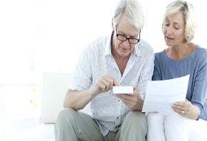 senior couple doing finances