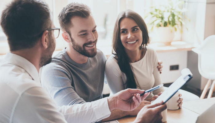 A young couple getting financial advice
