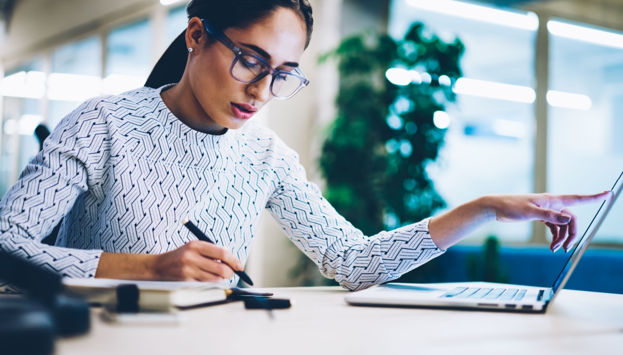 Young asian woman on laptop