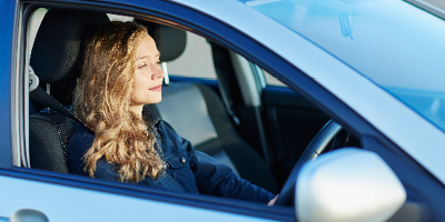 woman driving car