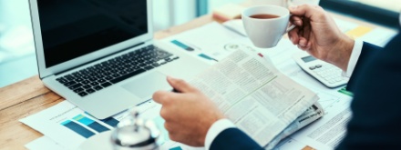 business man with laptop and coffee