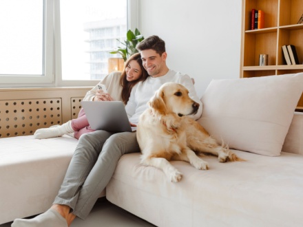 couple at home with dog