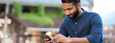 man sitting with phone