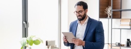 business man on tablet