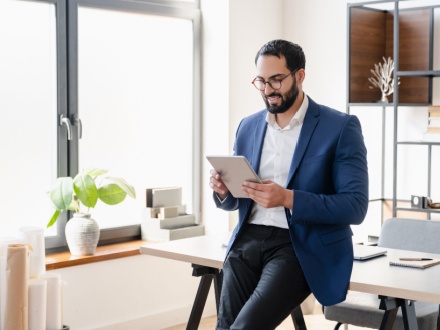 business man on tablet