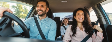 happy family driving