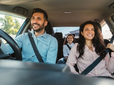 happy family driving