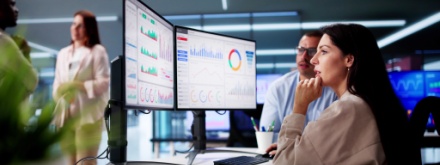 data analyst at computer screen