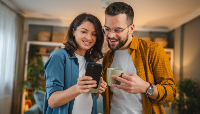young couple on phone
