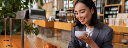 Woman in coffee shop on phone