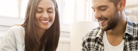 friends in coffee shop on phone