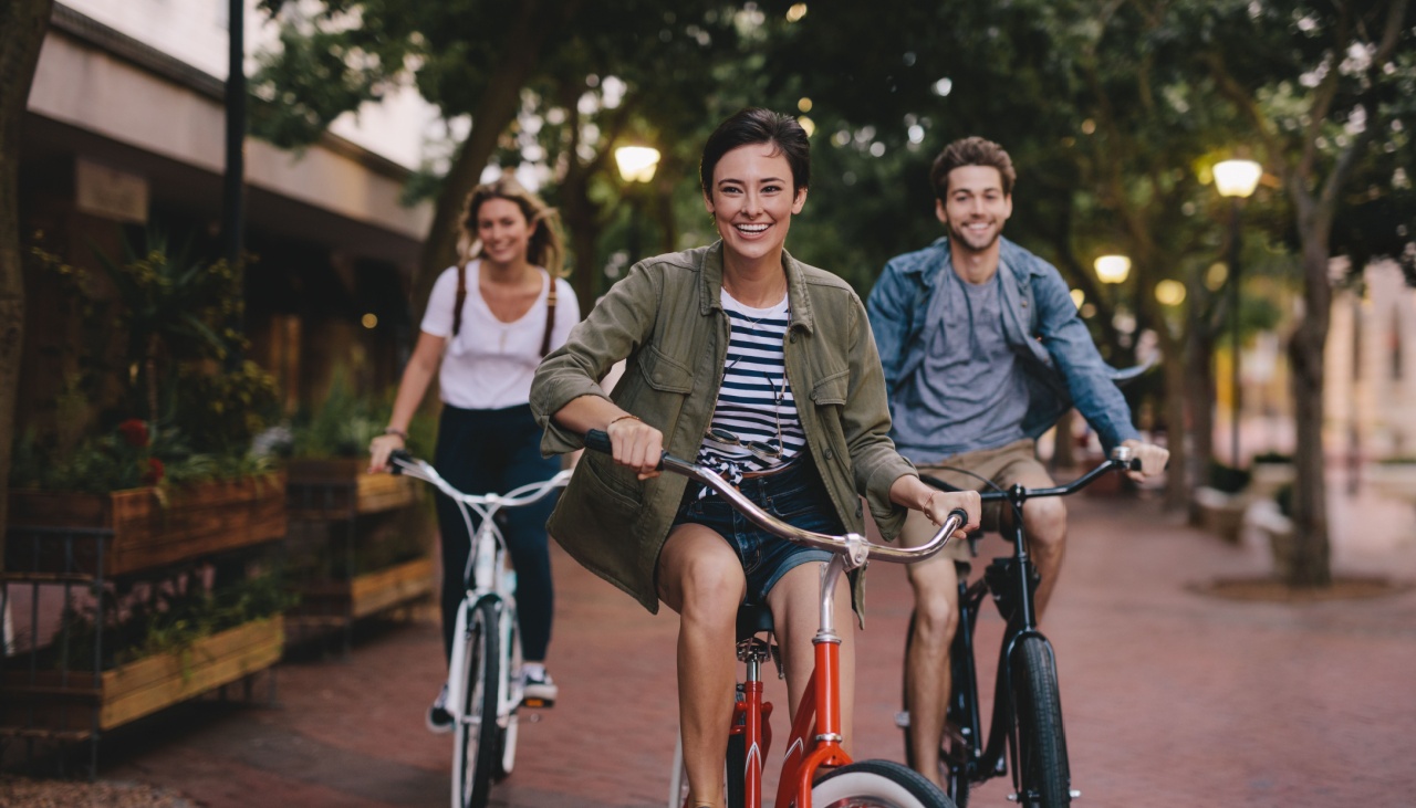 three young friends cycling bikes