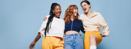 Group of three happy female friends