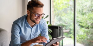 young man on digital tablet