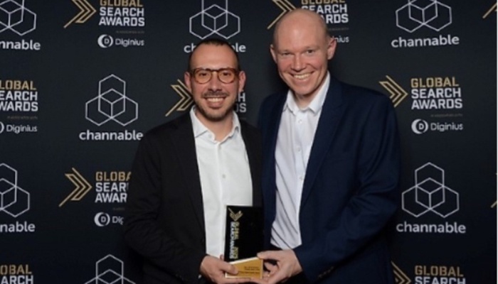 Sean Carty, head of digital marketing and Jannis Kiriasis SEO specialist from Zurich Ireland accepting a Global Search Award
