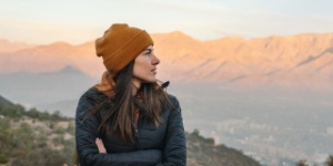 woman with mountain landscape in the background