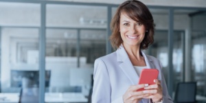 smiling woman on phone