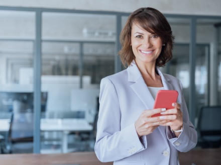 smiling woman on phone