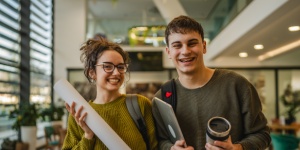young male and female college students in student accommodation