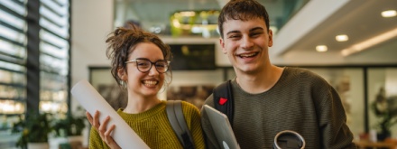 young male and female college students in student accommodation