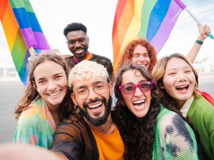 Selfie portrait of a group of lgbt mixed friends celebrating the gay pride parade