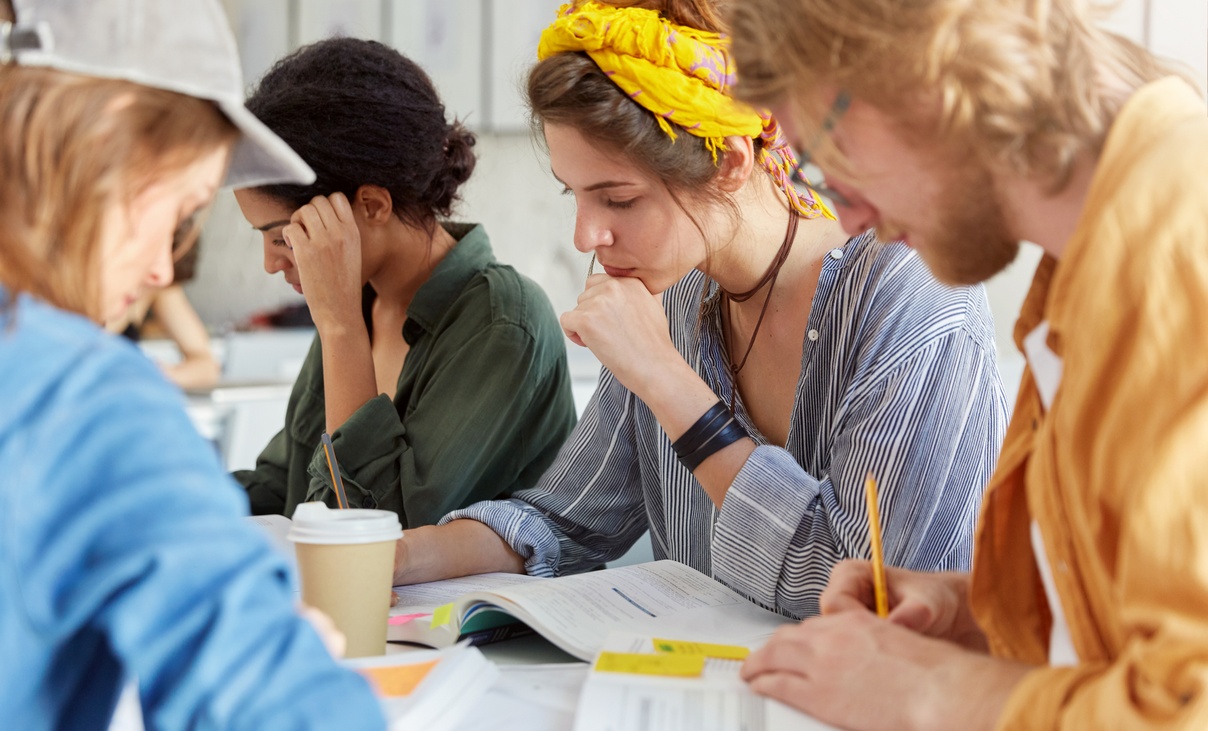 a group of diverse students studying together
