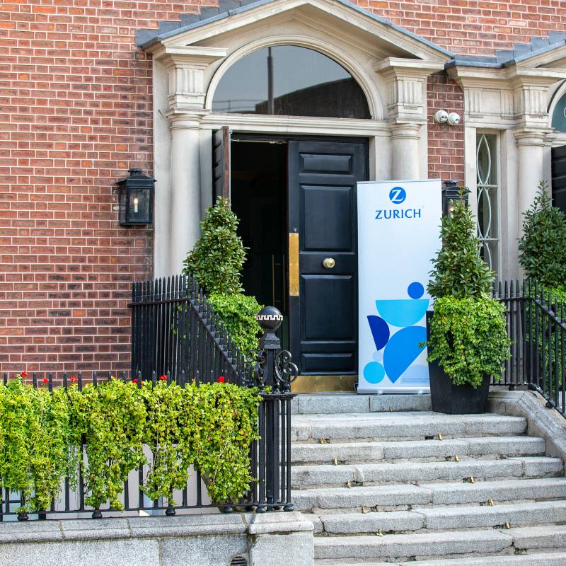 Open door with Zurich banner