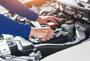 a mechanic working on a car