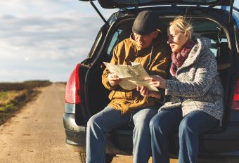 Couple checking a map