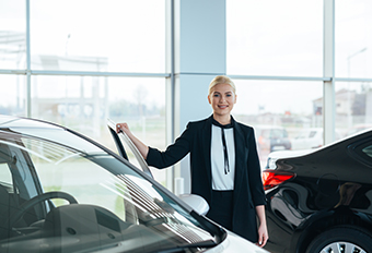 business women with a car