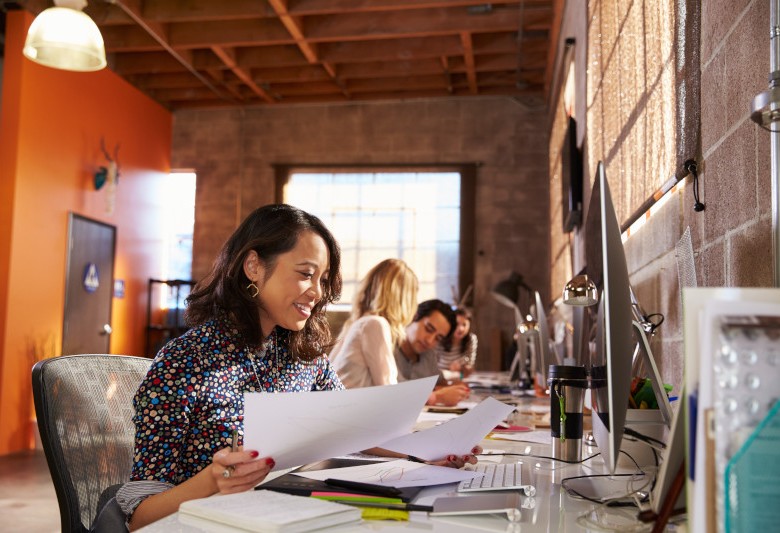 Woman in office doing paperwork