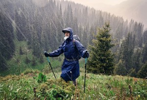 Man mountain walking in the rain