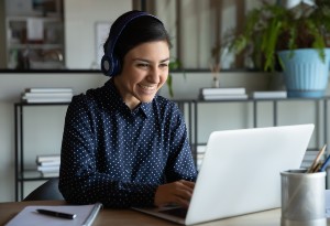 young working at home on laptop